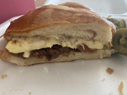 Bacon and egg croissant sandwich