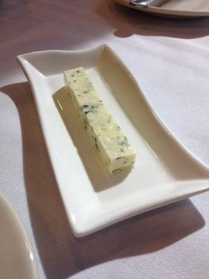 Herbed butter served with fresh bread