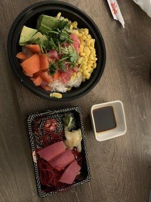 Poke bowl with tuna, corn, tomato, avocado, and cilantro. Tuna sashimi.