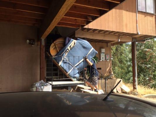 Moving a Yamaha baby grand through some very narrow cement stairs with a tight turn.