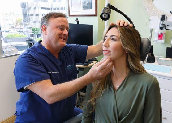 Dr. Griffiths with a Rhinoplasty patient.