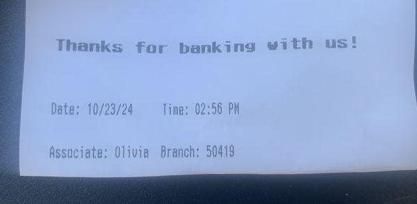 Transaction chit from one of two deposits on 10/23/24.  Printed upon it is the name of the teller on duty, Olivia.