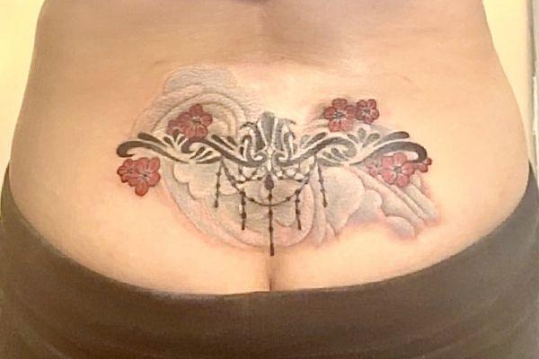 Lower back tattoo