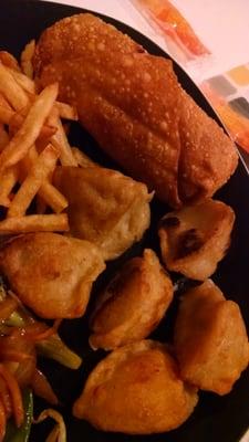 Fries, pork egg roll and fried dumplings