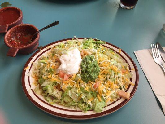 Supreme chicken tostada, enough for two people.