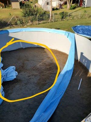 Holes in sand from original pool install found under original liner removal causing sharp pokes in liner