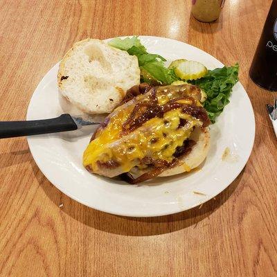 This is the Oostburger, hamburger patty, sliced Sheboygan brat, cheddar cheese and grilled onions.