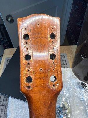 Headstock before the repair