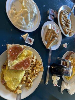 Ham & cheese omelette, biscuits and gravy, waffle, ultimate breakfast platter