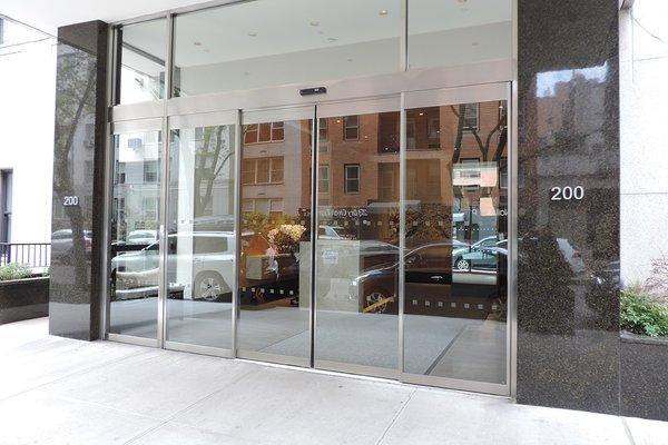 Call to treat your building to new sliding doors!