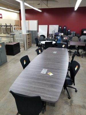 Collaborate with clients and coworkers by adding a conference table to your workspace!