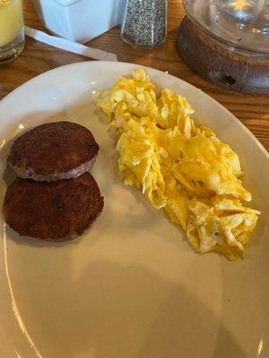 Eggs and some kind of sausage