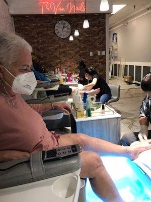 Mother gets her toes done