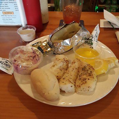 Baked Cod, drawn butter, roll, EXCELLENT baked Potato with all the fixings. Great Coleslaw, Lemon for the fish.