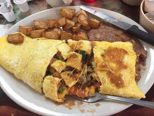 Omelette plate was HUGE- filled with sausage, fresh pico de gallo and shredded cheddar cheese- and delicious!