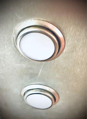 Elevator button look like pearl snap buttons!