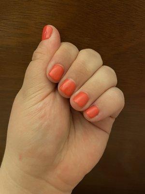 Trimmed nails with gel polish.