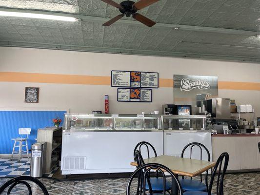 front of ice cream counter...blue cheese ice cream?!