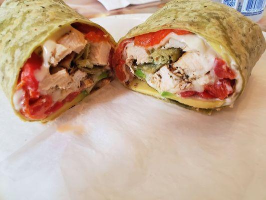 grilled chicken, avocado, provolone and roasted peppers on a spinach wrap