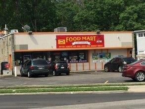 The former convenience store that was built in 1980 is well past the glory days. The former "food mart" is now a sketchy African Market