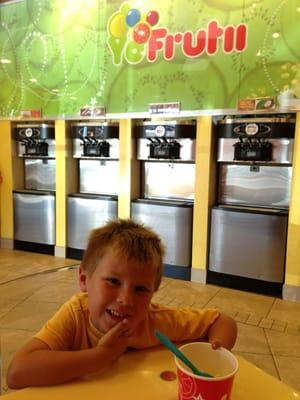 Loving his frozen yogurt!