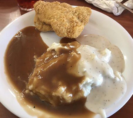 Mashed Potatoes with brown and cream gravy