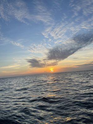 Sun setting as we boat out to the snorkel point