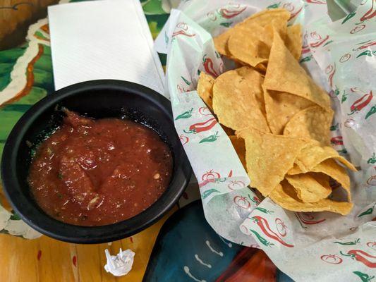 Chips and salsa that come with the meal