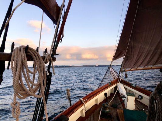 The bow of the Ginny Marie under sail in Port Jefferson.