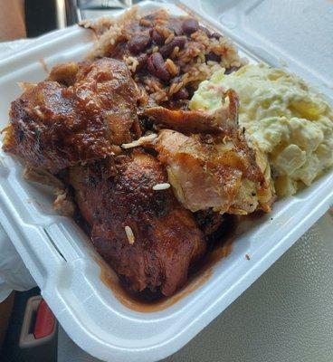 Jerk chicken with rice and peas and potato salad