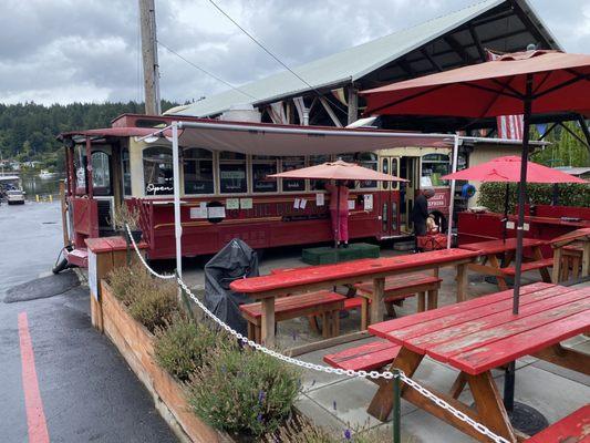 Plenty of outside seating. Umbrellas cover some of the tables