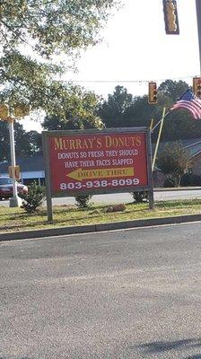 Sign did it's job. Had to see what these doughnuts were about