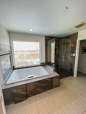 Customs tile and shower with glass door