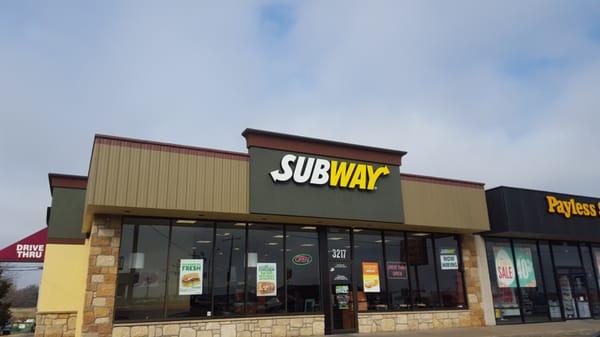 Front of the store facing East towards Topeka Blvd.