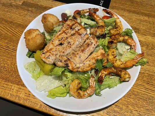 Greek salad with grilled salmon and shrimp