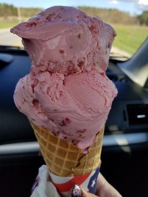 Their Baby cone size of Red Raspberry Icecream. Picture taken after eating part of it. Huge and enjoyed all of it :)