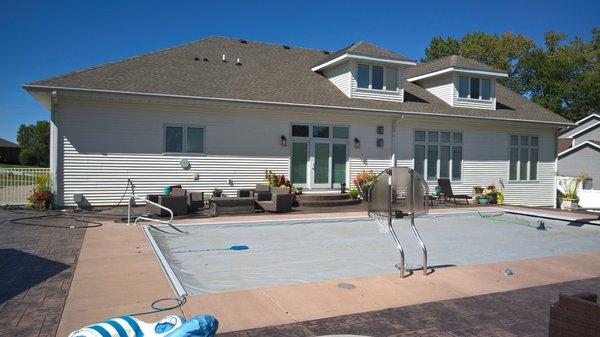 Basketball hoop on fox auto cover pool.