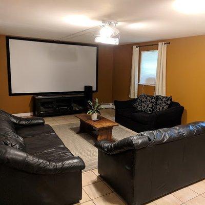 120" screen home theater with surround sound at 56 Handy Street