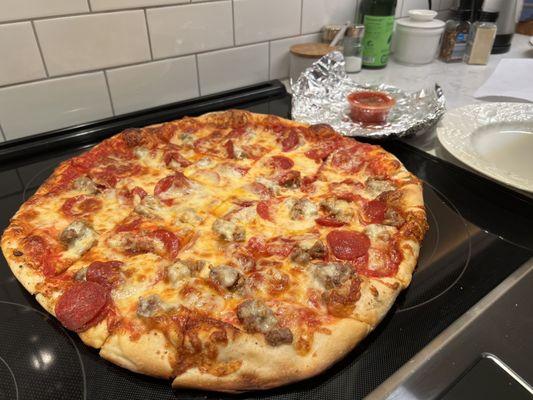 Large Sausage and Pepperoni extra cheese.