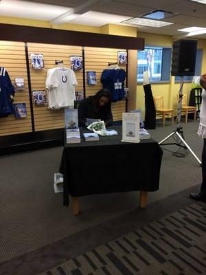 Shay Spivey signing her book -- "How to Submit A Winning Scholarship Application"