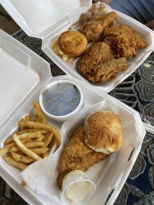 Fried chicken with mac & cheese, mashed potatoes, and cornbread (top) Spicy fried catfish with fries, green beans, and roll (bottom)