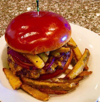 "In A Pickle" Steak Burger topped with deep fried pickles.