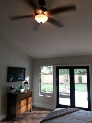 Ceiling fan/ light controlled with dual dimmer, Lutron. TV wall mount and receptacle and low voltage.