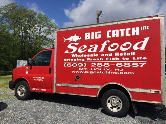 Big Catch Seafood red truck deliver fresh seafood everyday.