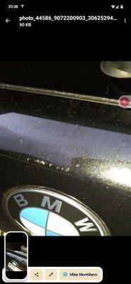 This a picture of the scratch on the rear bumper near the trunk that the company took.