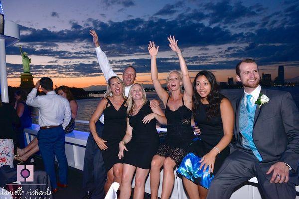 Guests aboard Aqua Azul's open rooftop deck.