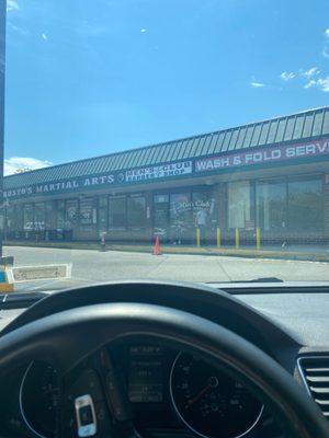 Storefront located in between Busto's Martial Arts and the Laundromat of Holbrook in the Holbrook Center plaza.