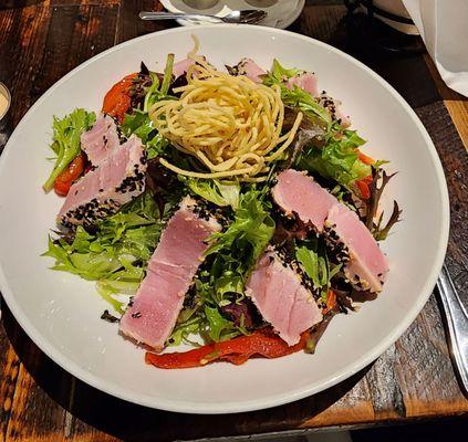 Rare sesame crusted tuna salad entree.