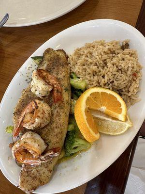 Catfish with shrimp and rice.