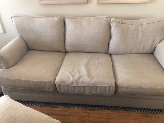 My pricey couch that has hardly ever been used that  the fabric is all stretched out - totally pilling and looks plain awful!